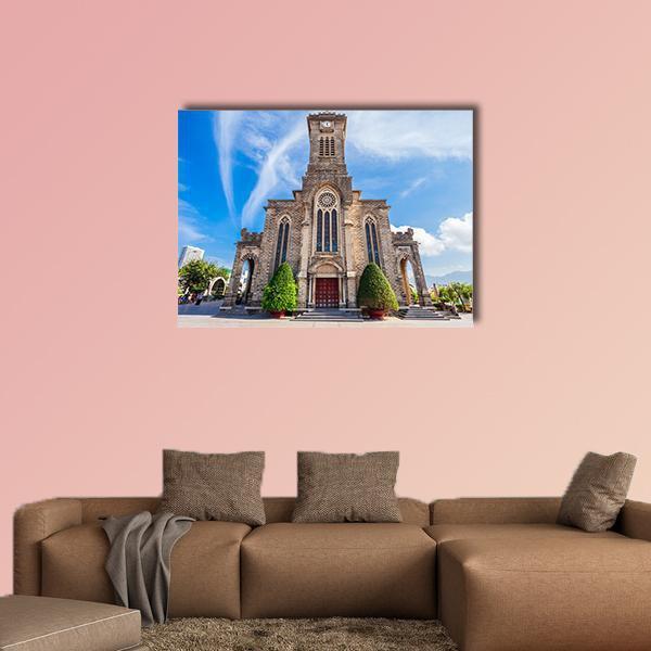Nha Trang Cathedral Under Blue Sky Canvas Wall Art in gray, brown and blue, single panel hung on a wall