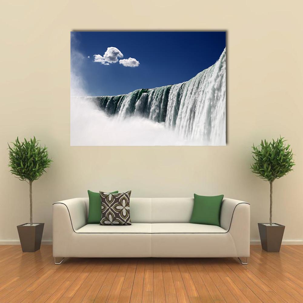 Niagara Falls Waterfall Scene Canvas Wall Art in white, green and blue, single panel hung on a wall