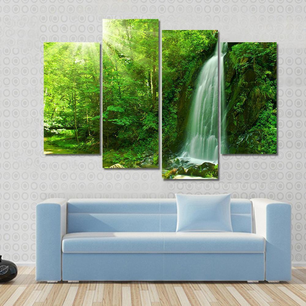 Waterfall Through Green Forest Canvas Wall Art-4 Pop-Gallery Wrap-50" x 32"-Tiaracle