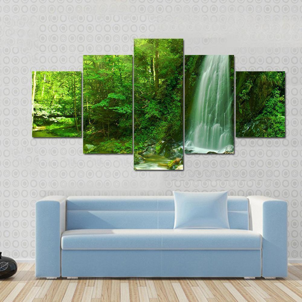 Waterfall Through Green Forest Canvas Wall Art-5 Star-Gallery Wrap-62" x 32"-Tiaracle
