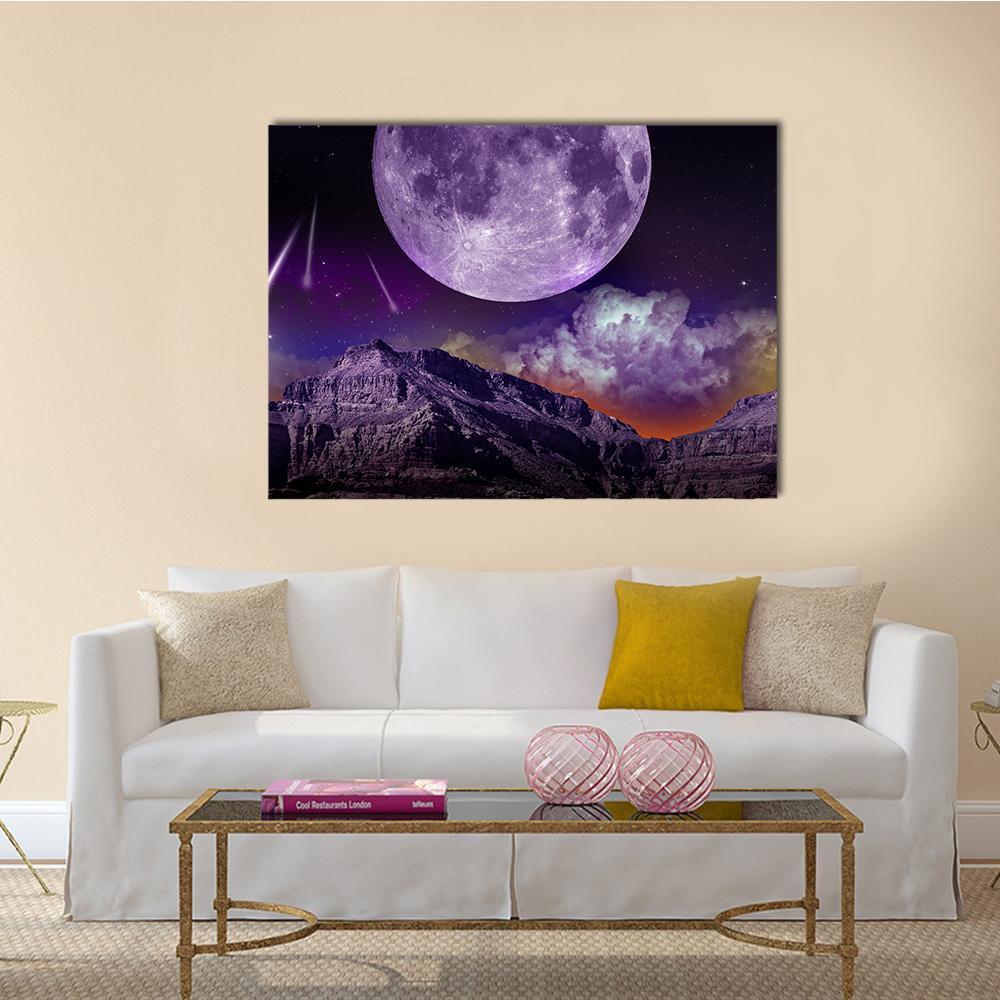 Purple Moon Over Rugged Mountains Canvas Wall Art in black and purple, single panel hung on a wall