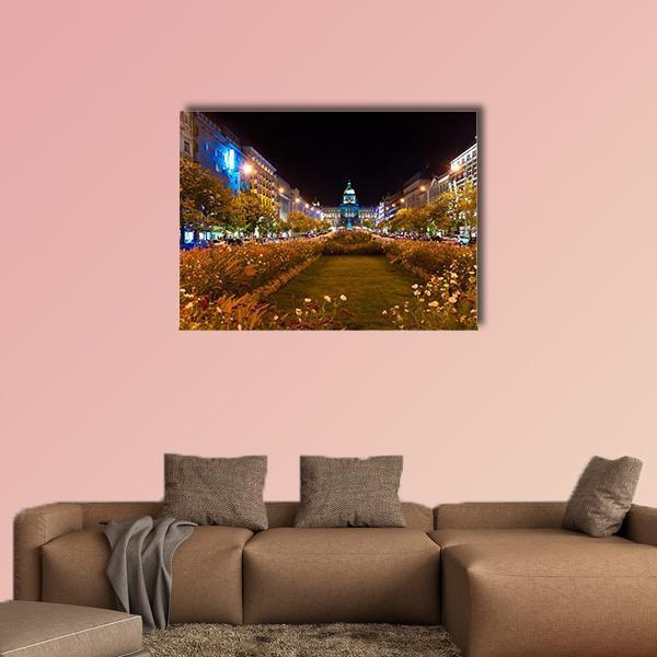 Prague City at Night Canvas Wall Art in black, yellow and blue, single panel hung on a wall