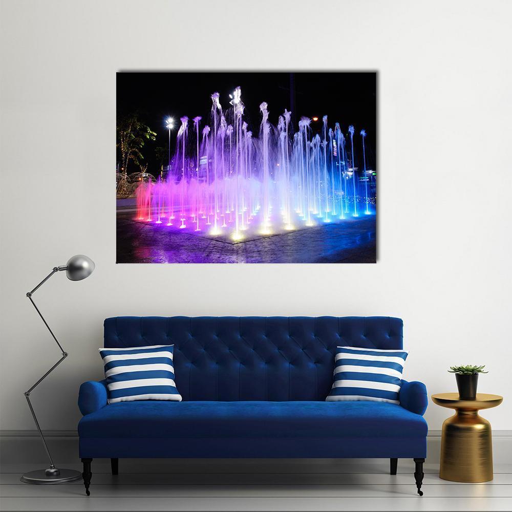 Dancing Fountains at Night Canvas Wall Art in black, blue and purple, single panel hung on a wall