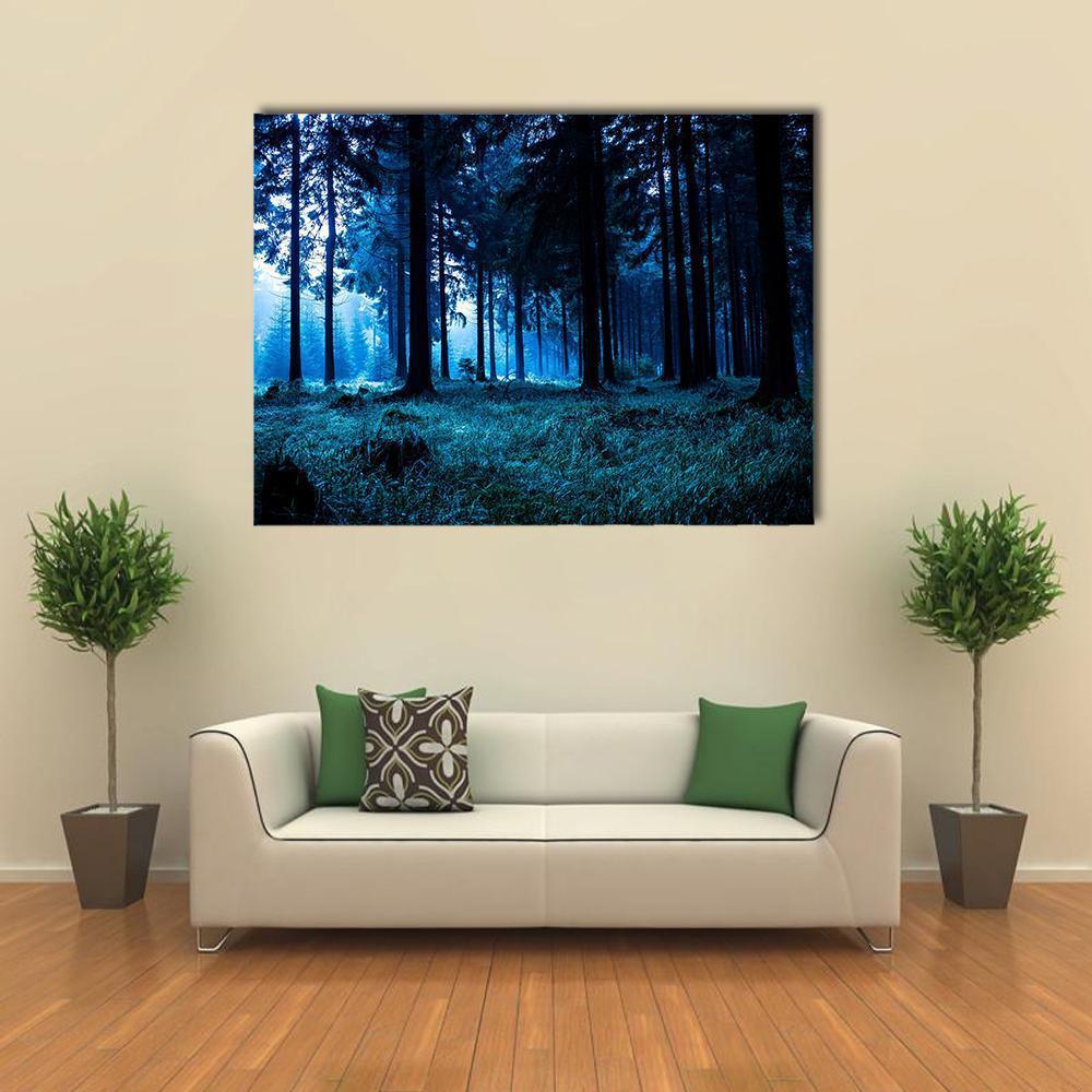 Misty Autumn Forest Landscape Canvas Wall Art in black and blue, single panel hung on a wall