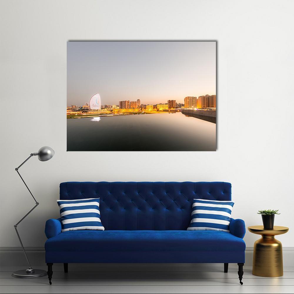 Baku Skyline at Sunset Canvas Wall Art in gray, orange and yellow, single panel hung on a wall