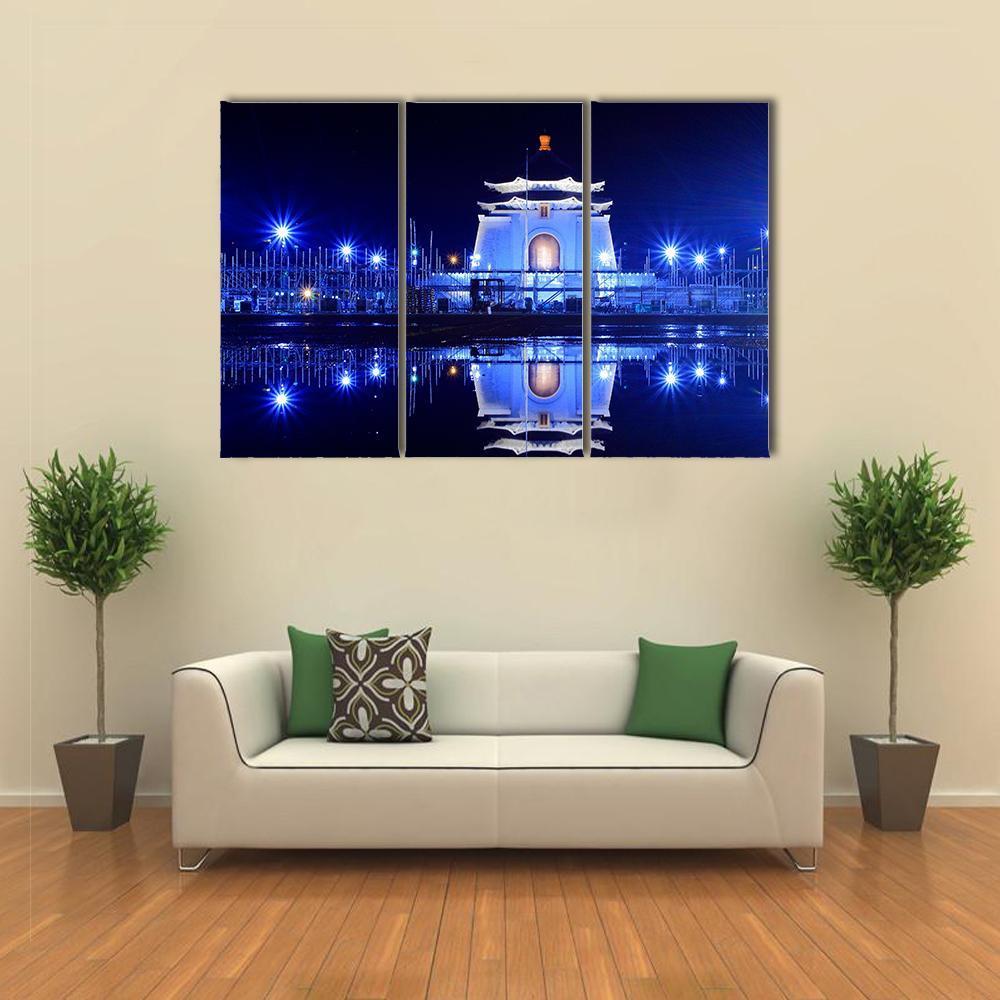 Chiang Kai Shek Memorial at Night Canvas Wall Art in black, white and blue, 3 panel horizontal set hung on a wall