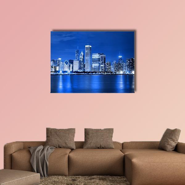 Chicago Night Skyline Canvas Wall Art in white, blue and navy, single panel hung on a wall
