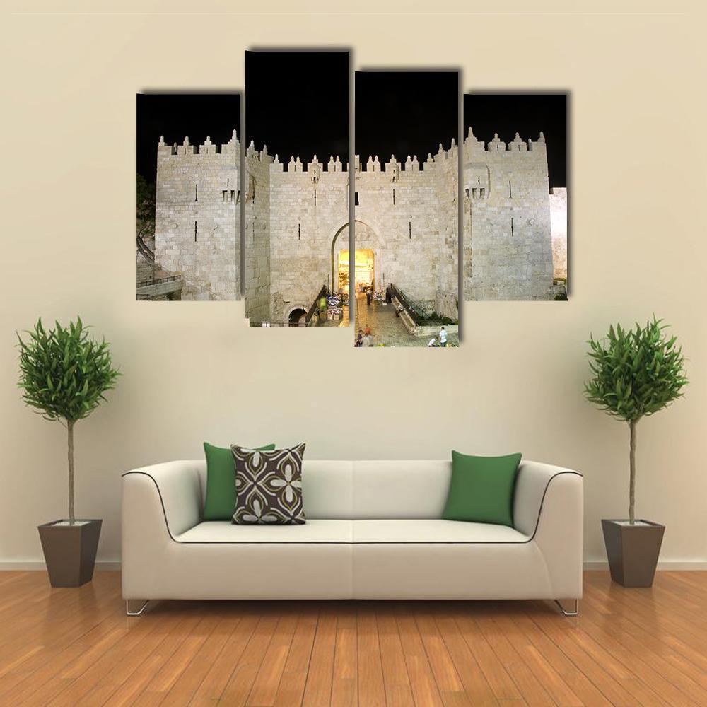 Damascus Gate Entrance at Night Canvas Wall Art in black, gray and beige, 4 panel Pop layout hung on a wall