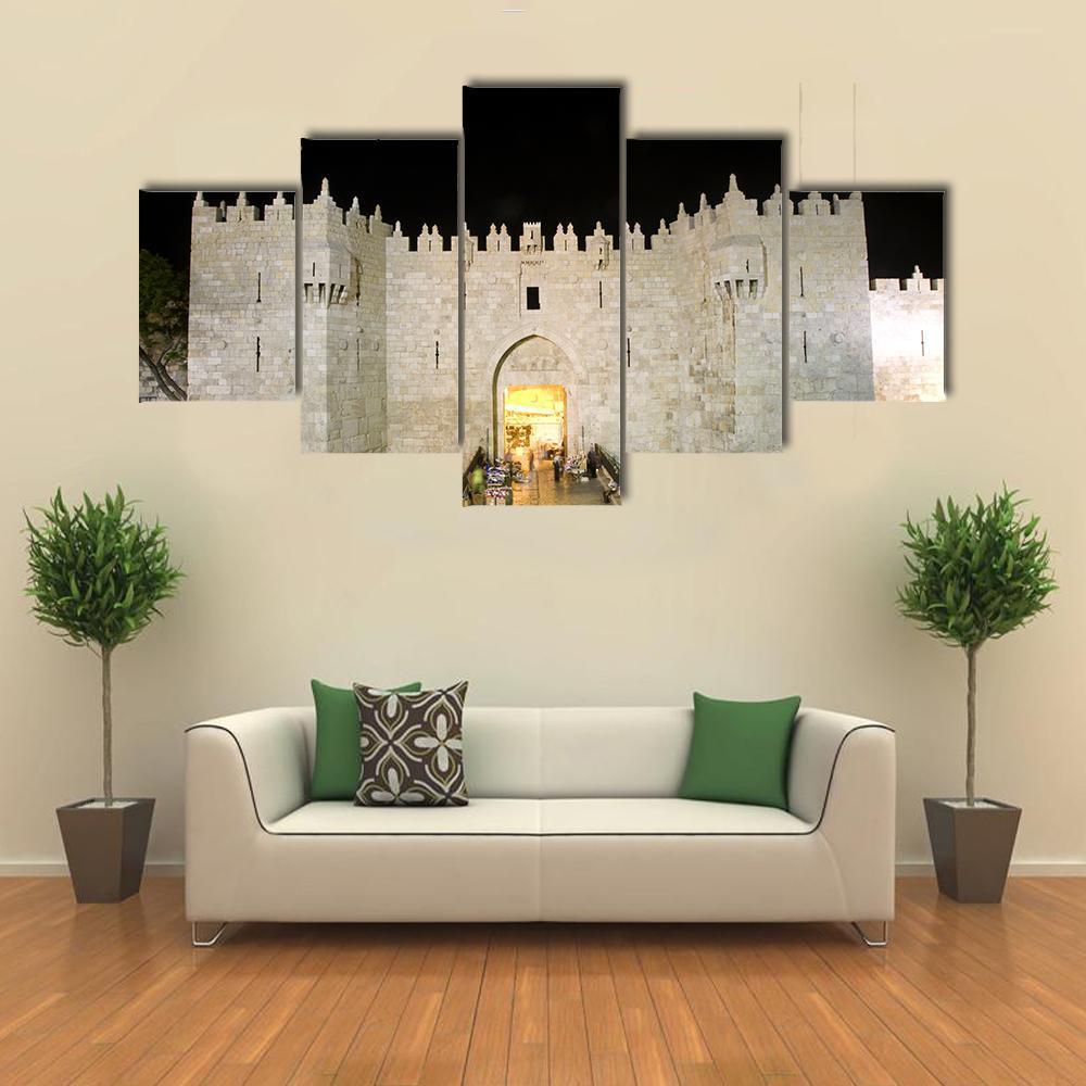 Damascus Gate Entrance at Night Canvas Wall Art in black, gray and beige, 5 panel Pop layout hung on a wall