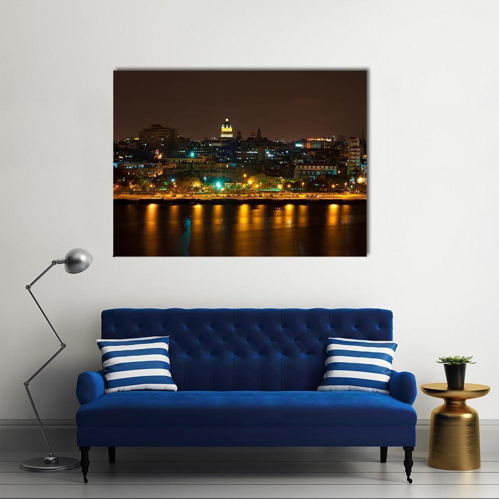 Havana Night Skyline with River Reflections Canvas Wall Art in black, gold and yellow, single panel hung on a wall