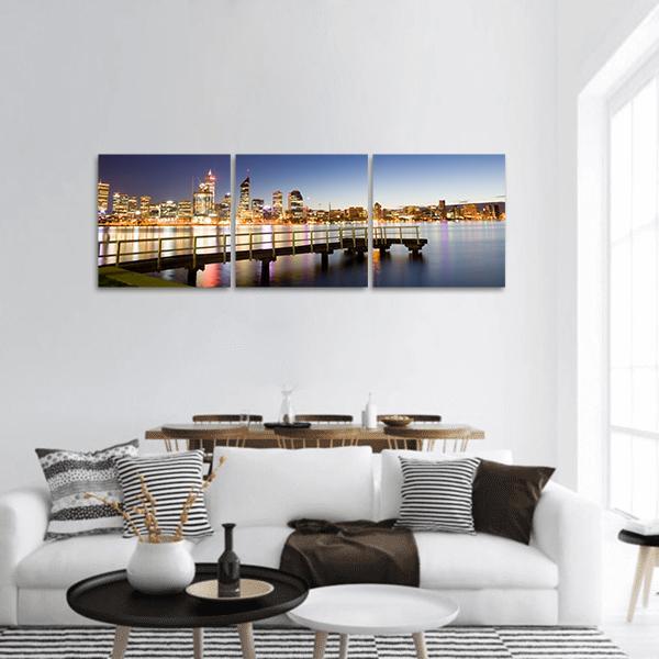 Perth River Skyline at Dusk Panoramic Canvas Wall Art in black, yellow and blue, hung on a wall