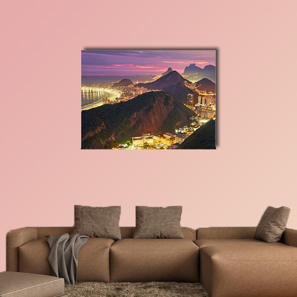 Rio De Janeiro Night Skyline Canvas Wall Art in black, yellow and purple, single panel hung on a wall