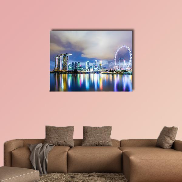 Singapore Skyline at Night Canvas Wall Art in yellow, blue and purple, single panel hung on a wall