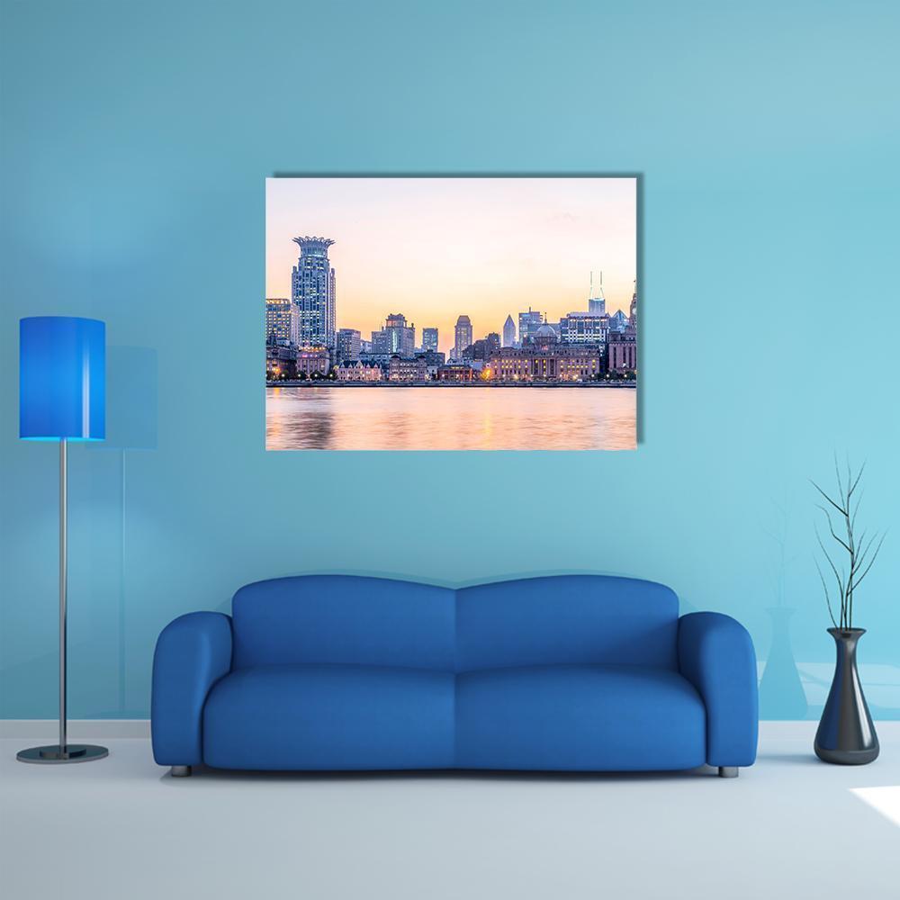 The Bund Shanghai Twilight Skyline Canvas Wall Art in orange, blue and pink, single panel hung on a wall