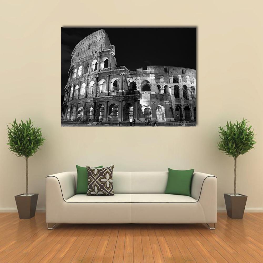 Nighttime Colosseum in Black and White Canvas Wall Art in black, white and gray, single panel hung on a wall
