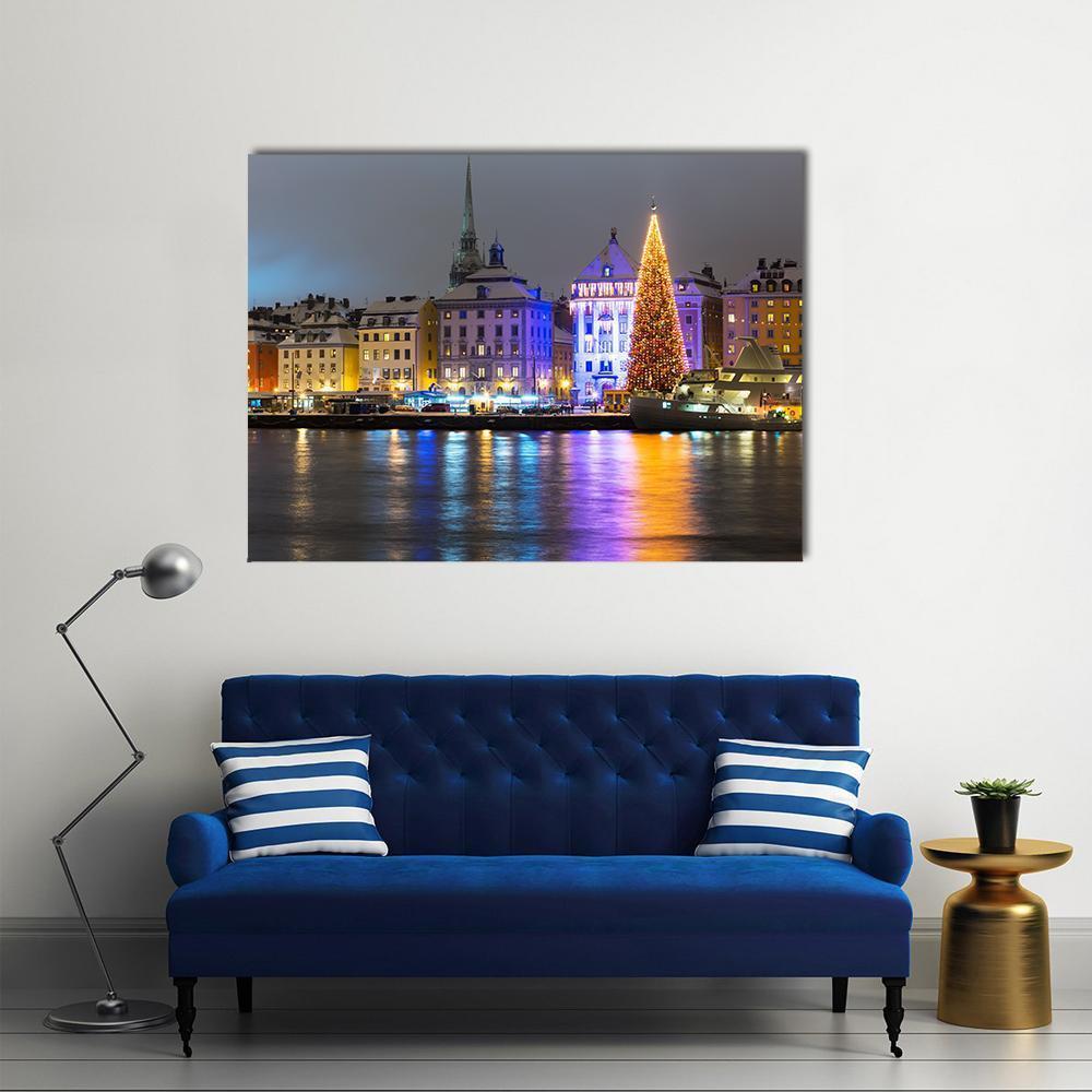 Gamla Stan at Night Canvas Wall Art in black, yellow and blue, single panel hung on a wall