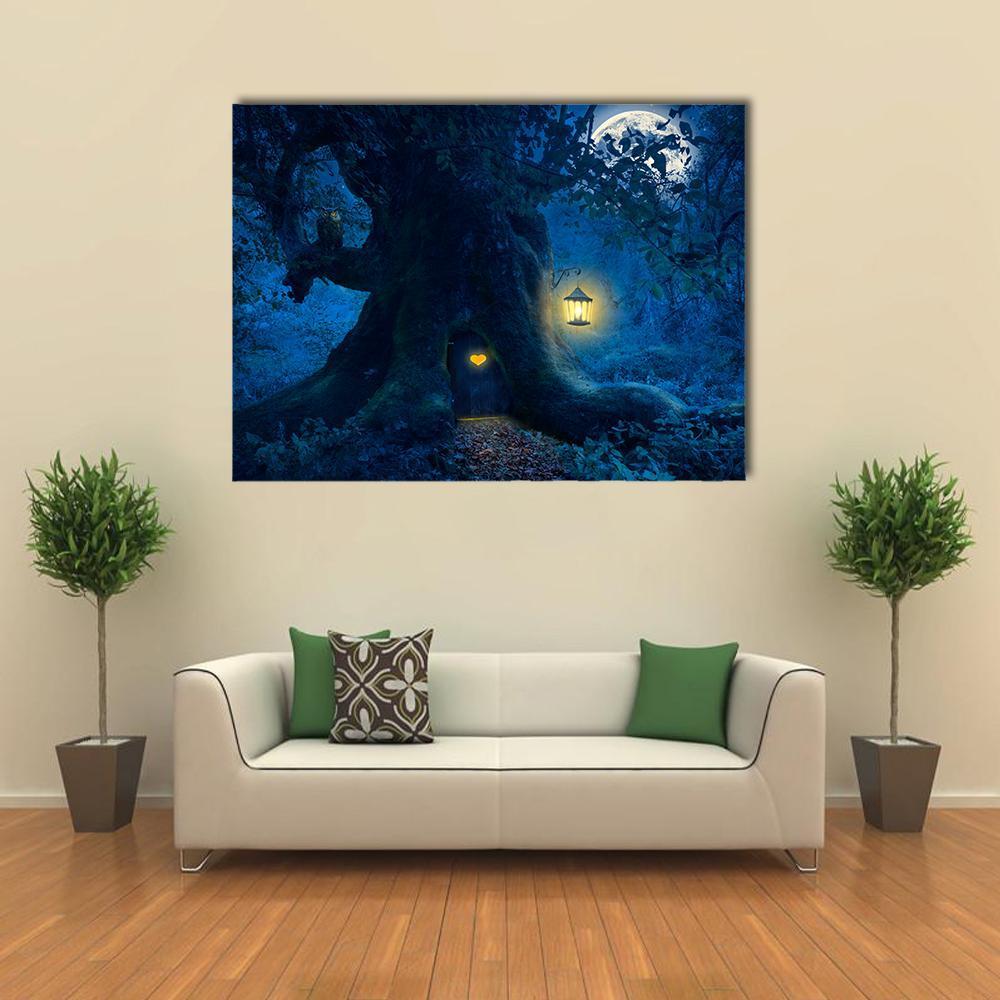 Enchanted Moonlit Tree with Lantern Canvas Wall Art in black, blue and navy, single panel hung on a wall