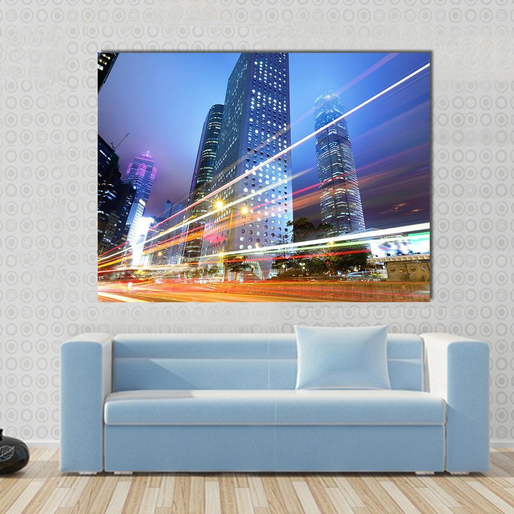 Night with City Skyscrapers Canvas Wall Art in white, blue and navy, single panel hung on a wall