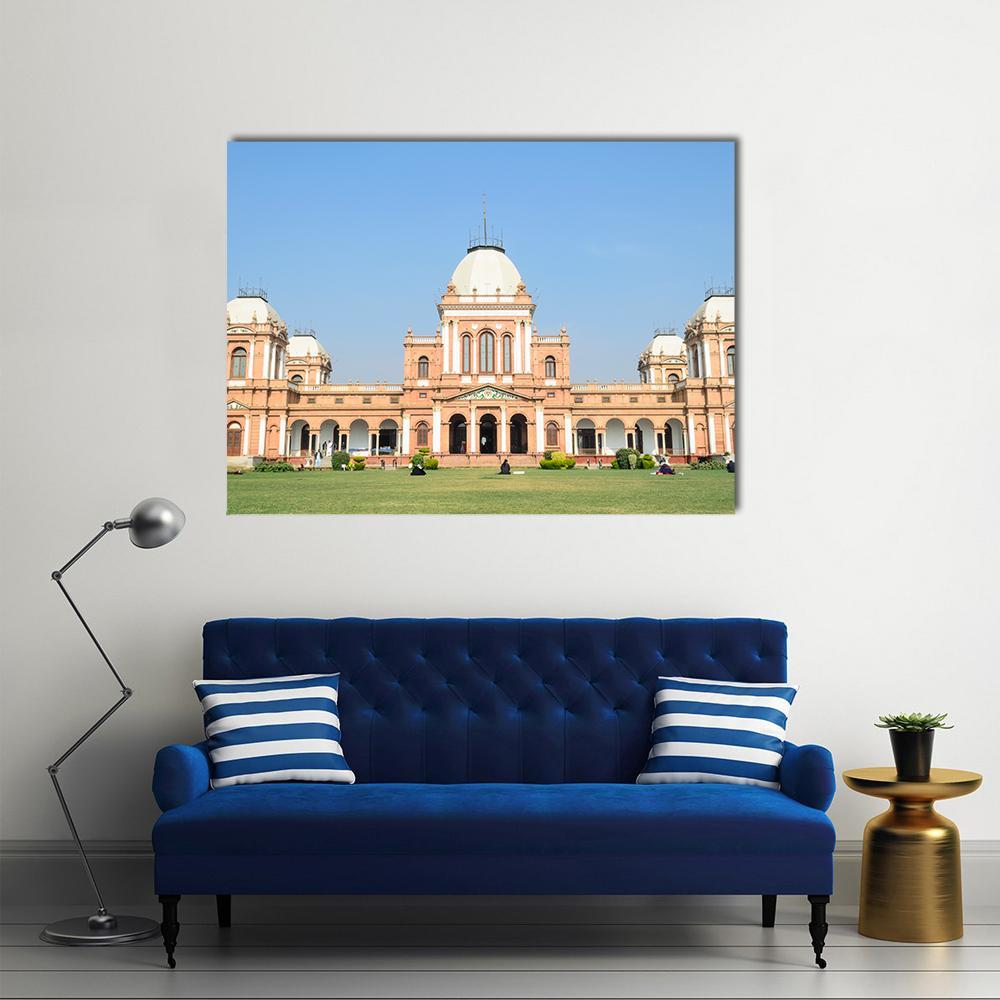 Noor Mahal Bahawalpur Canvas Wall Art in beige, orange and blue, single panel hung on a wall