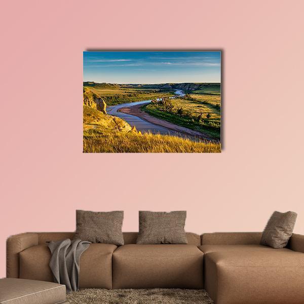 North Dakota Badlands Canvas Wall Art in brown, green and blue, single panel hung on a wall