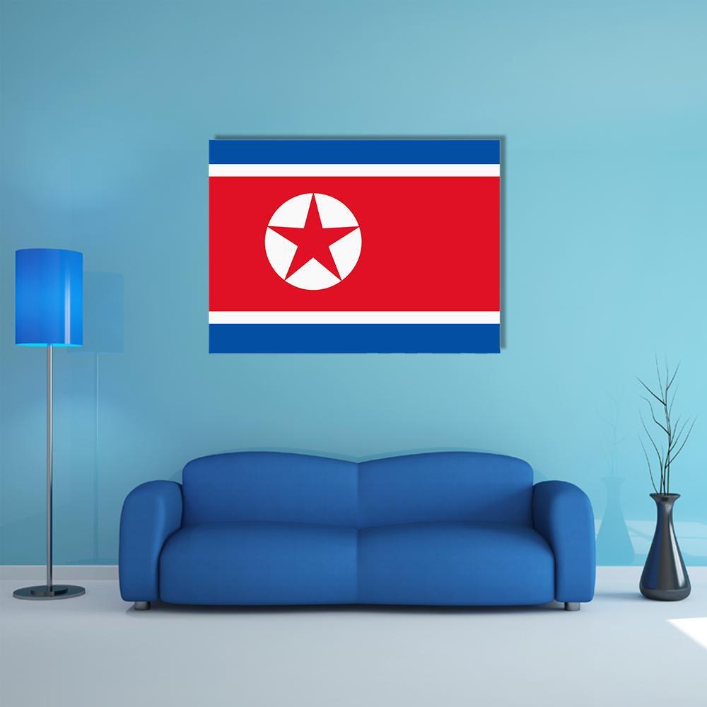 North Korea Flag Canvas Wall Art in white, red and blue, single panel hung on a wall
