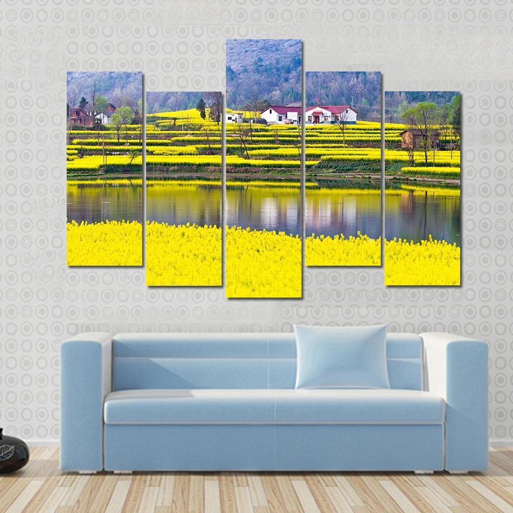 Rural Spring Scenery Canvas Wall Art in yellow, green and blue, 4 panel Pop layout hung on a wall