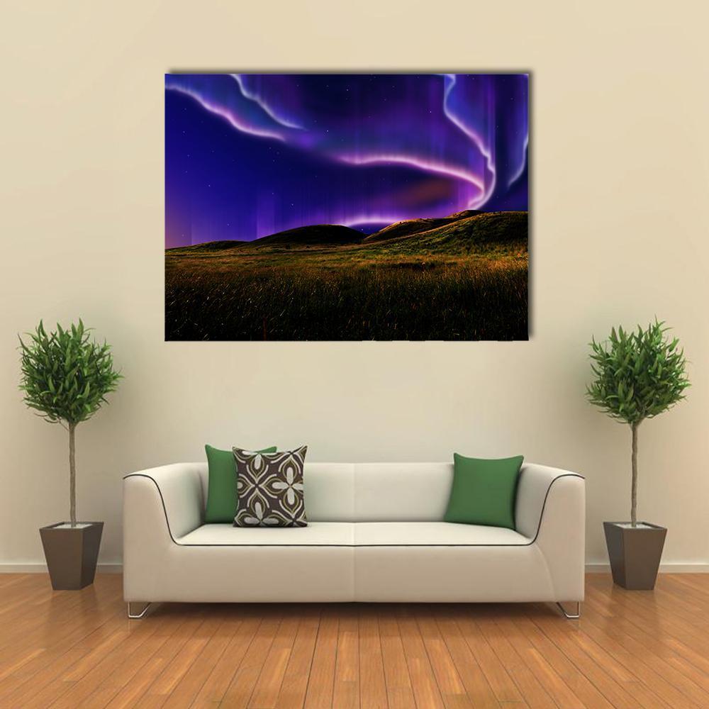 Northern Light on Silent Field Canvas Wall Art in green, blue and purple, single panel hung on a wall