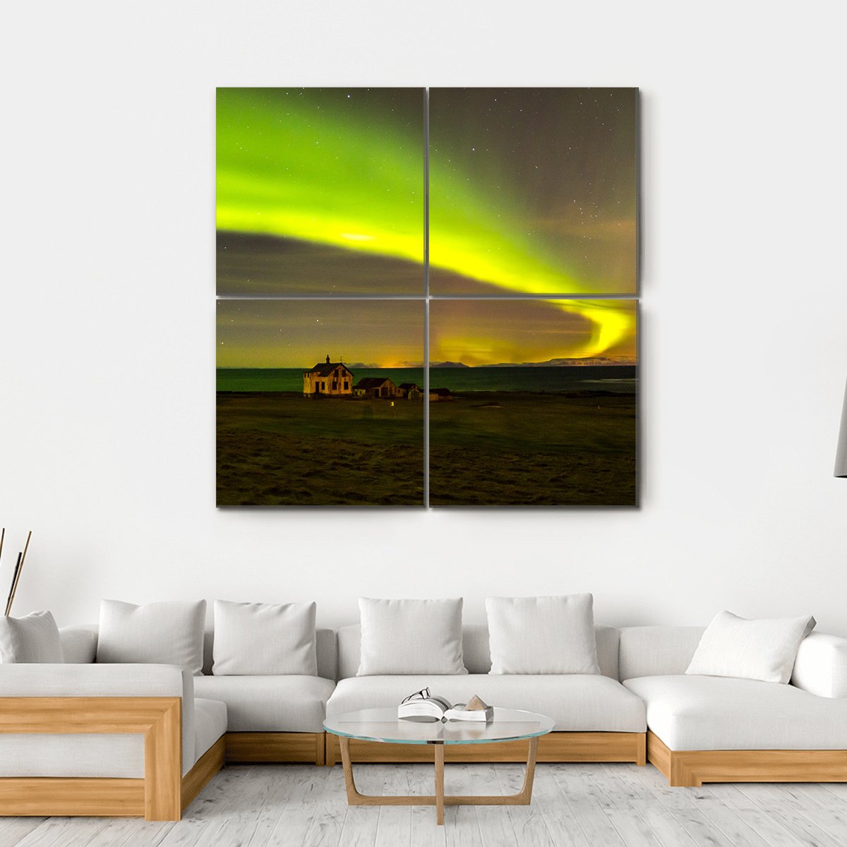 Northern Lights Over Iceland Canvas Wall Art in black, yellow and green, hung on a wall