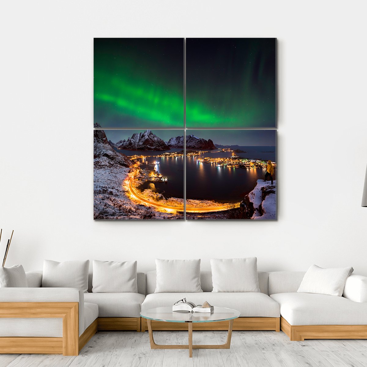 Northern Lights Over Reine Canvas Wall Art in black, green and blue, hung on a wall
