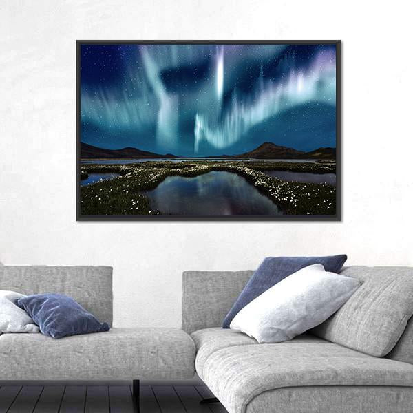 Northern Lights Over Wildflowers Canvas Wall Art in green, blue and purple, single panel hung on a wall