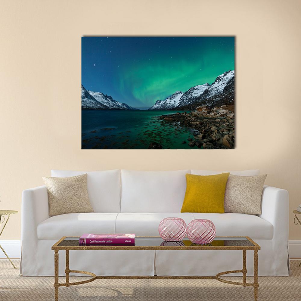 Aurora Borealis Over Fjords Canvas Wall Art in black, green and blue, single panel hung on a wall
