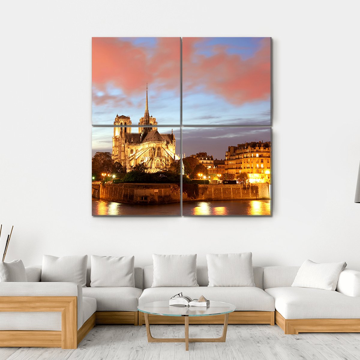 Notre Dame Cathedral at Dusk Canvas Wall Art in orange, yellow and blue, hung on a wall