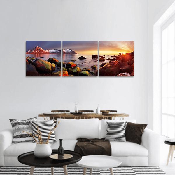 Norway Sunset Over Arctic Coast Panoramic Canvas Wall Art in brown, orange and blue, hung on a wall