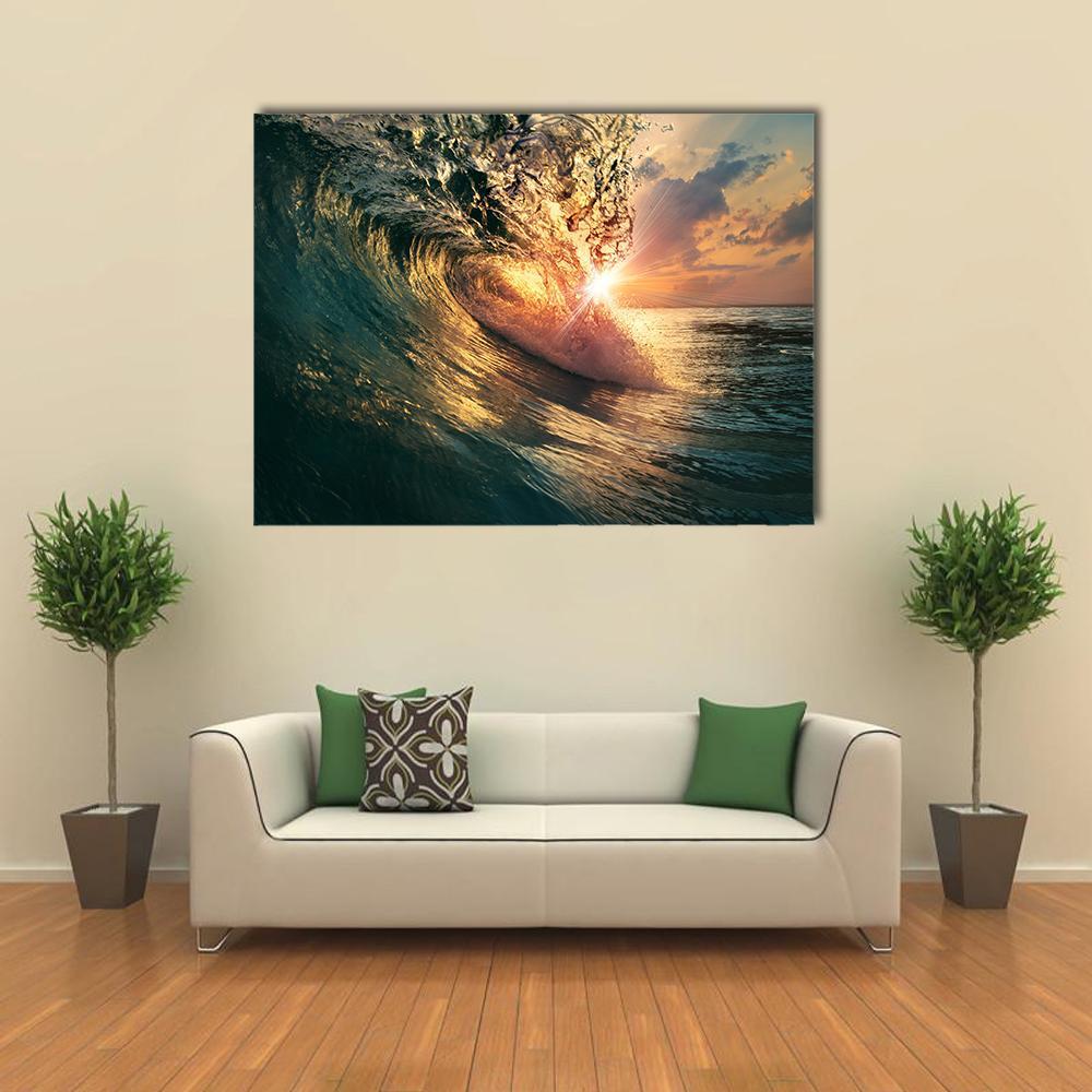 Sunlit Ocean Wave at Sunset Canvas Wall Art in orange, yellow and blue, single panel hung on a wall