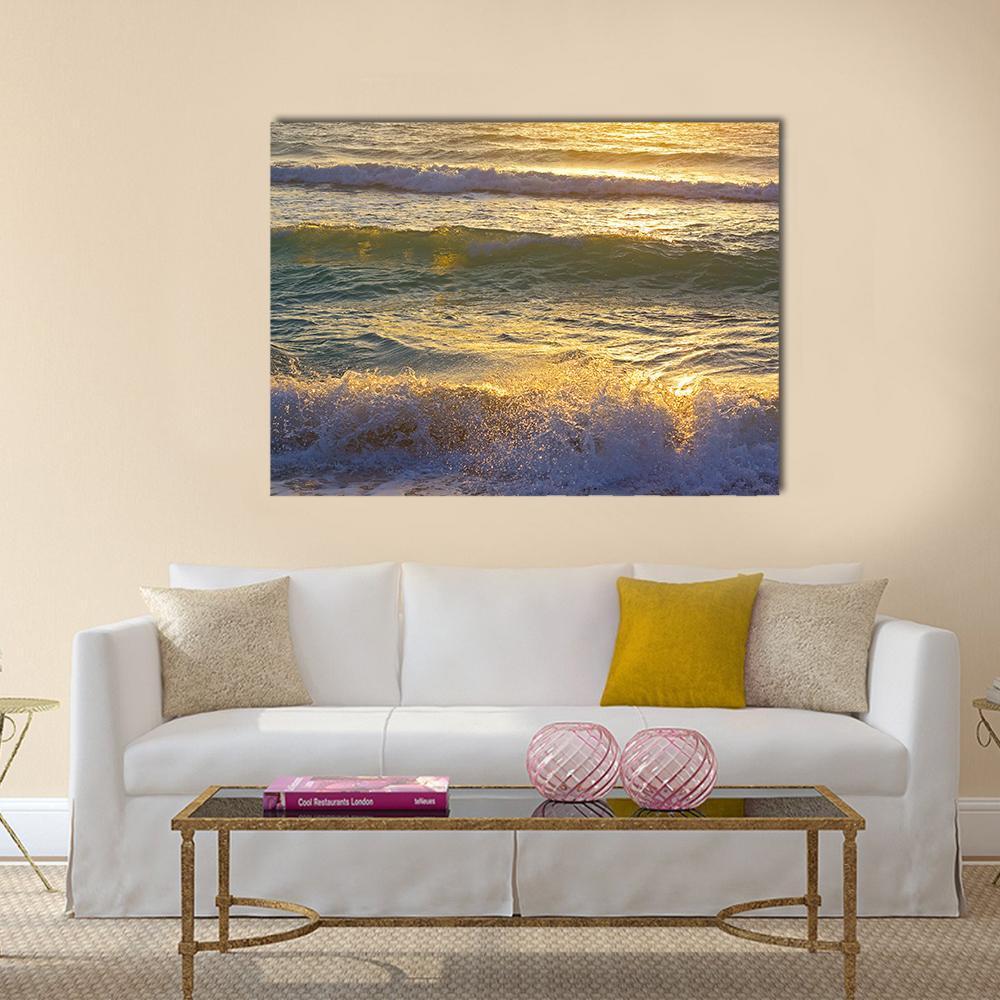 Ocean Waves at Miami Beach Canvas Wall Art in gold, yellow and blue, single panel hung on a wall