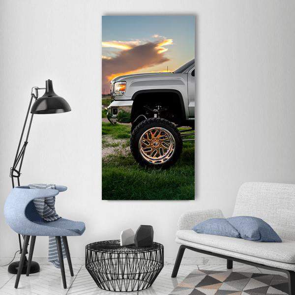 Off-road Truck at Golden Hour Vertical Canvas Wall Art in gray, orange and green, single vertical panel hung on a wall