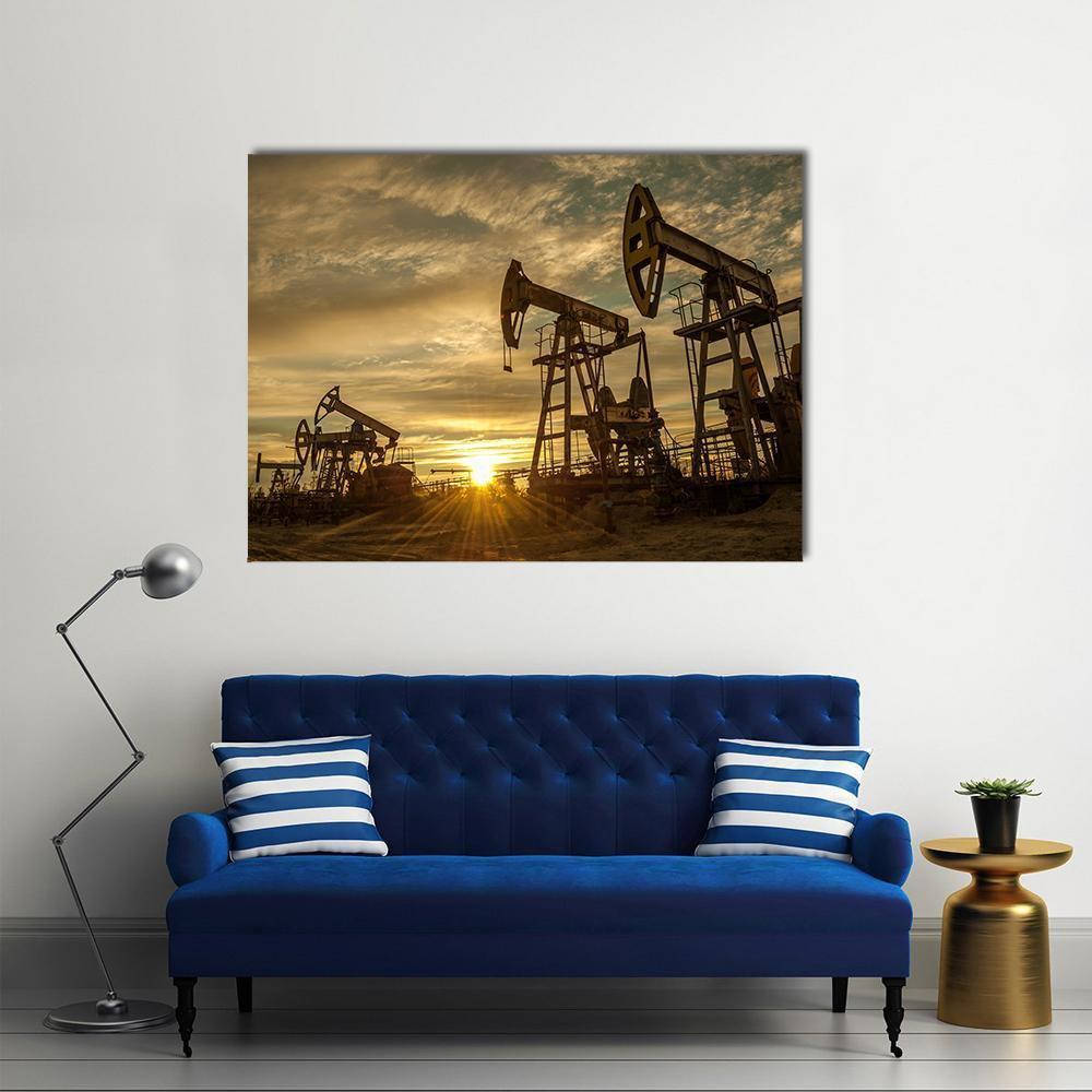 Oil Pump Jacks at Sunset Canvas Wall Art in brown, orange and yellow, single panel hung on a wall
