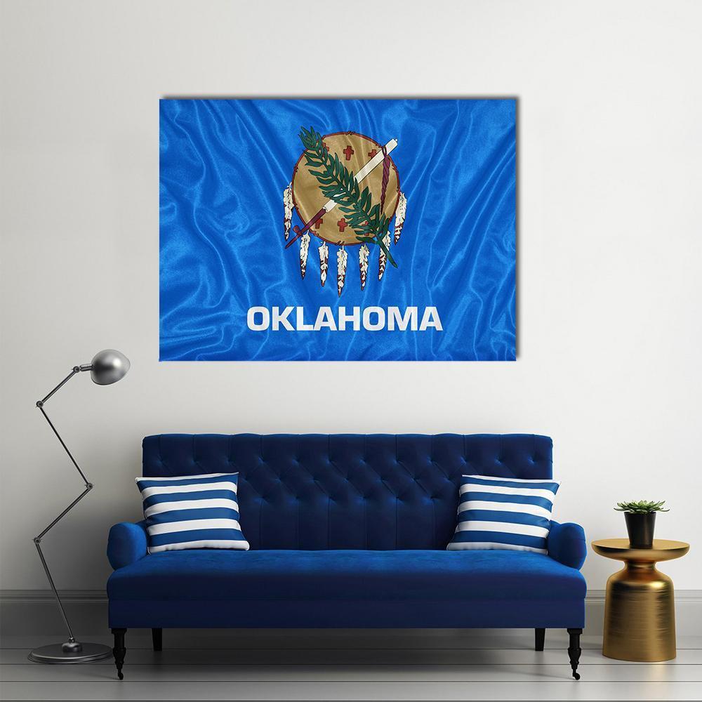 Oklahoma State Flag Canvas Wall Art in white, brown and blue, single panel hung on a wall