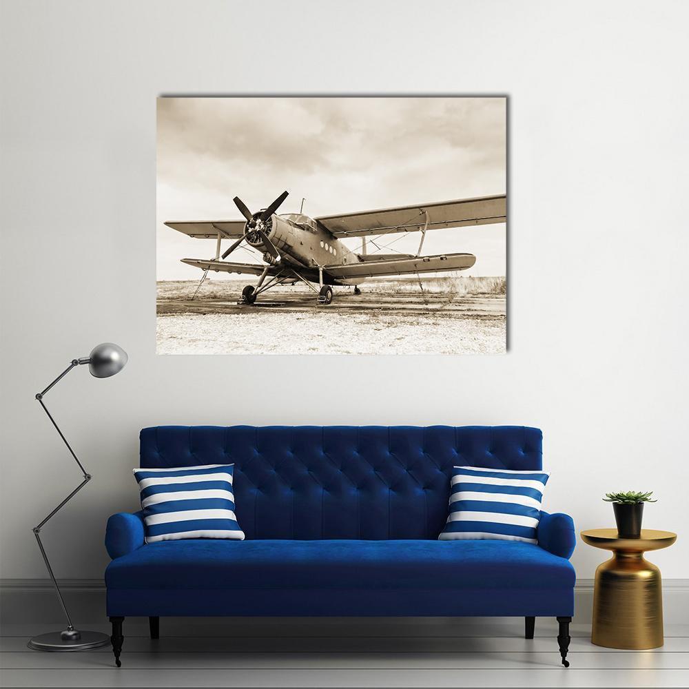 Vintage Biplane in Sepia Canvas Wall Art in gray, beige and brown, single panel hung on a wall