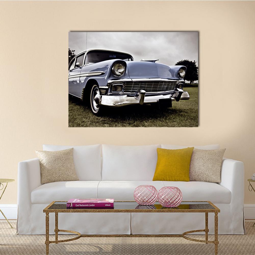 Blue Vintage American Car Close Up Canvas Wall Art in gray, silver and blue, single panel hung on a wall