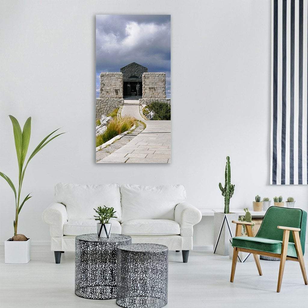 Njegoš Mausoleum on Mount Lovćen Vertical Canvas Wall Art in gray, beige and blue, single vertical panel hung on a wall