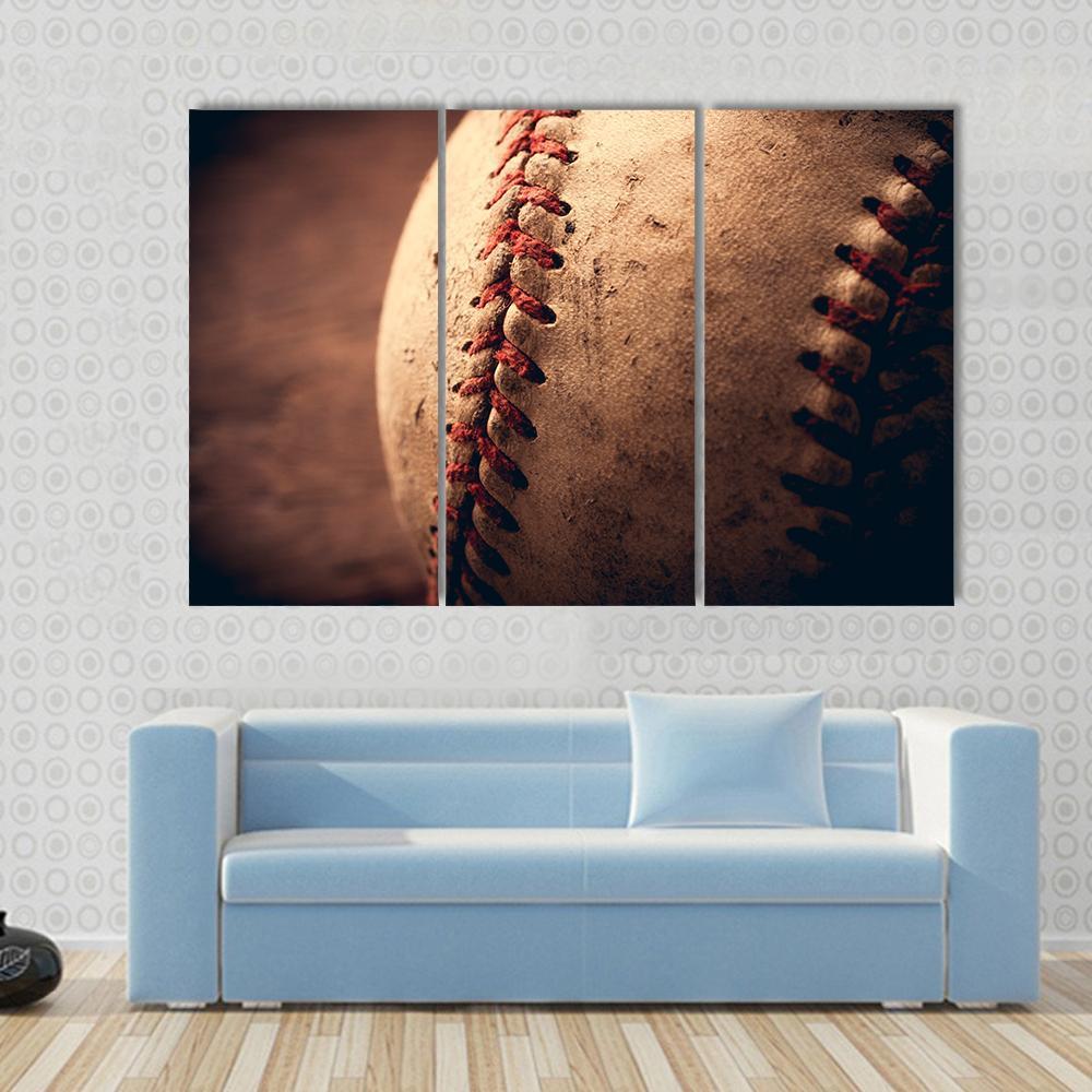 Old Baseball Canvas Wall Art in beige, brown and red, 3 panel horizontal set hung on a wall