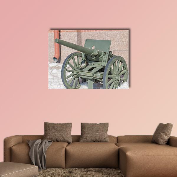 Old Russian Green Cannon with Wooden Wheels Canvas Wall Art in gray, brown and green, single panel hung on a wall