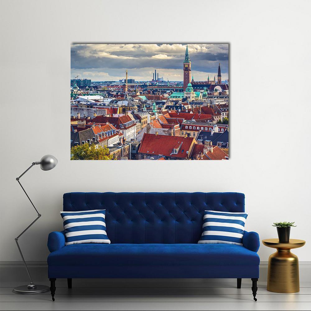 Copenhagen City Skyline with Green Spire Canvas Wall Art in gray, red and blue, single panel hung on a wall