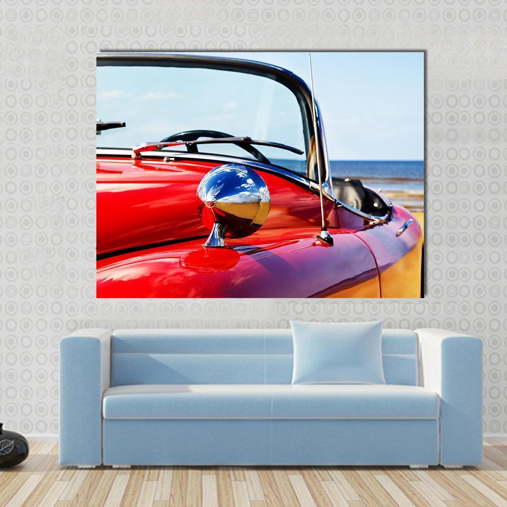 Red Convertible Car at Beach Canvas Wall Art in silver, red and blue, single panel hung on a wall