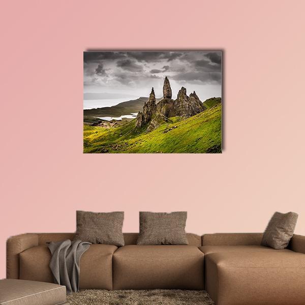 Storr Rock, Scotland Landscape Canvas Wall Art in gray, brown and green, single panel hung on a wall