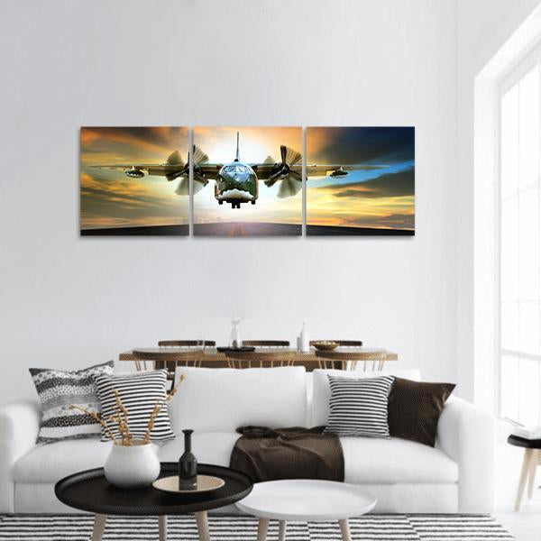 Old Military Cargo Plane at Dusk Panoramic Canvas Wall Art in gray, orange and blue, hung on a wall