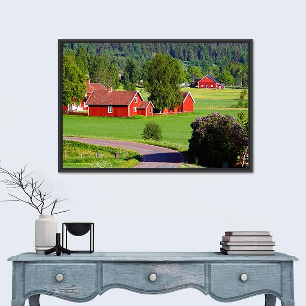 Old Red Farmhouses Canvas Wall Art in red and green, framed canvas, product view on a white background