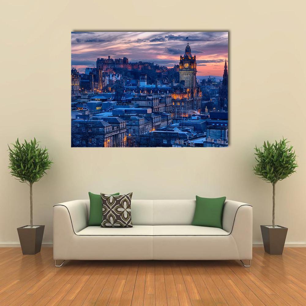 Edinburgh Castle Dusk Cityscape Canvas Wall Art in orange, blue and purple, single panel hung on a wall