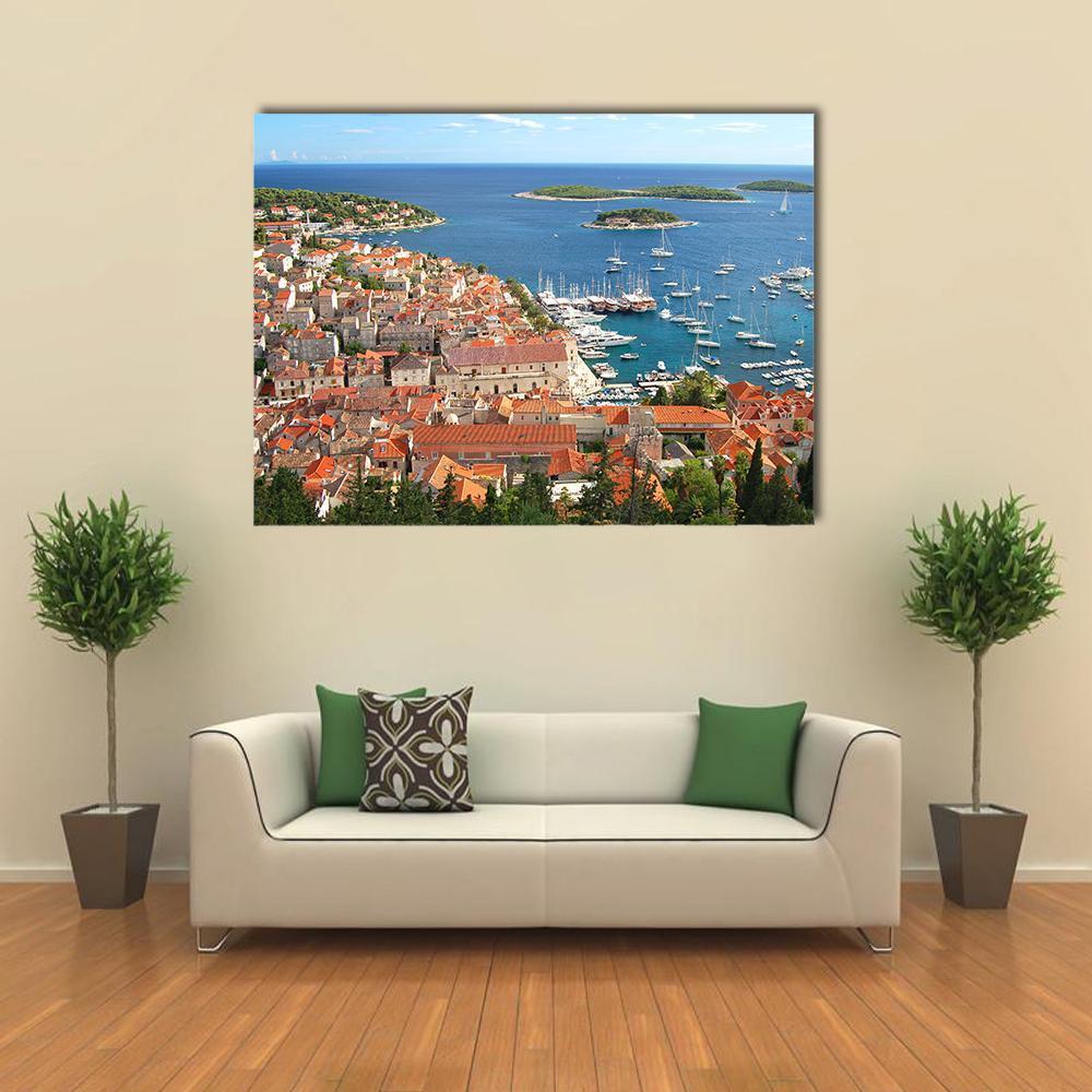 Old Town of Hvar, Croatia Canvas Wall Art in red, orange and blue, single panel hung on a wall